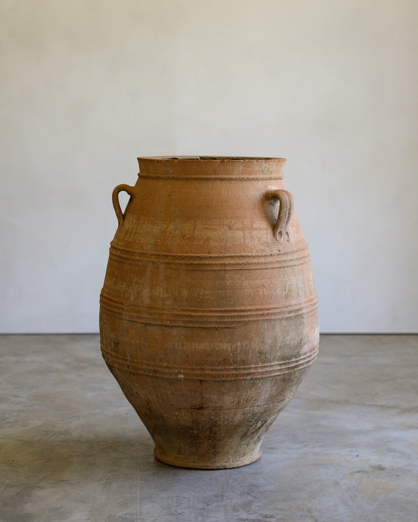 antique tapered turkish handled olive jar with etching details and natural patina