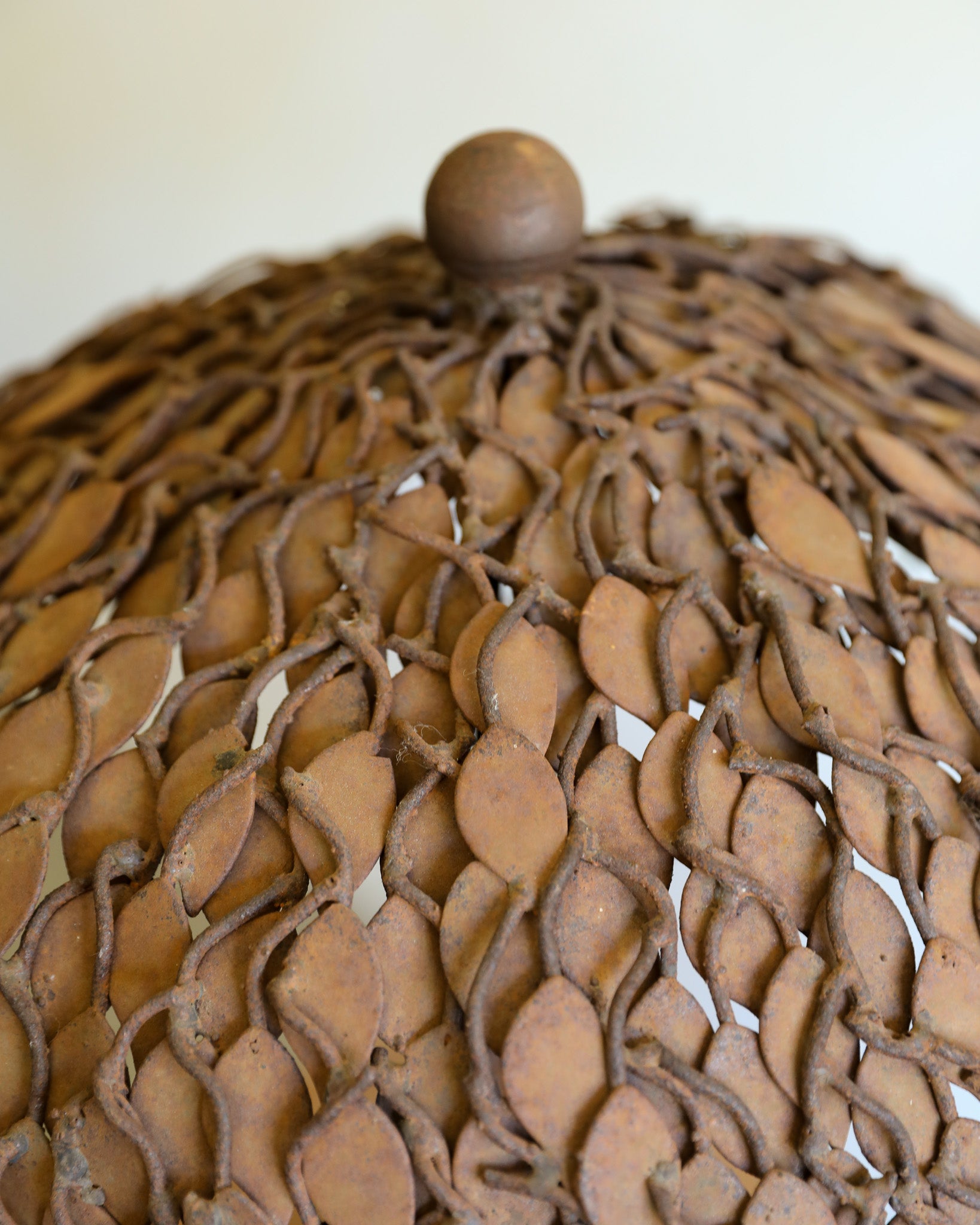 close up detail of metal leaf table lamp brutalist vintage
