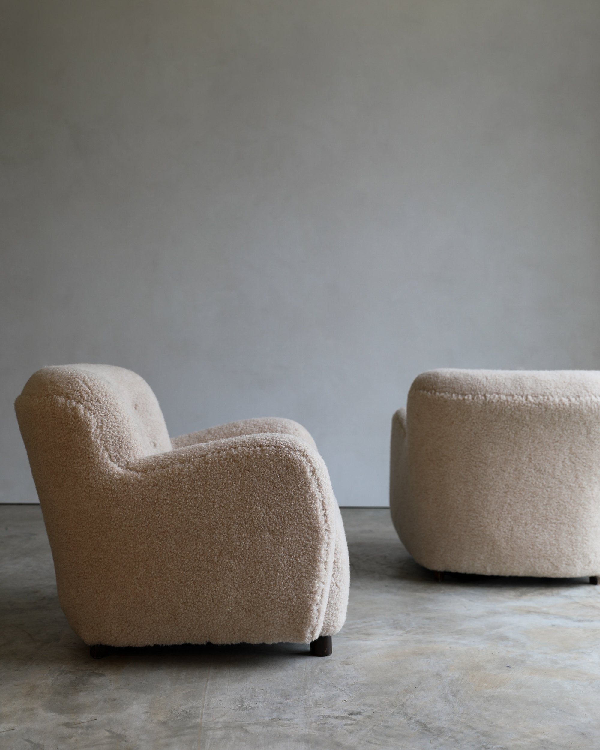 vintage sheepskin curvy danish lounge chair side view