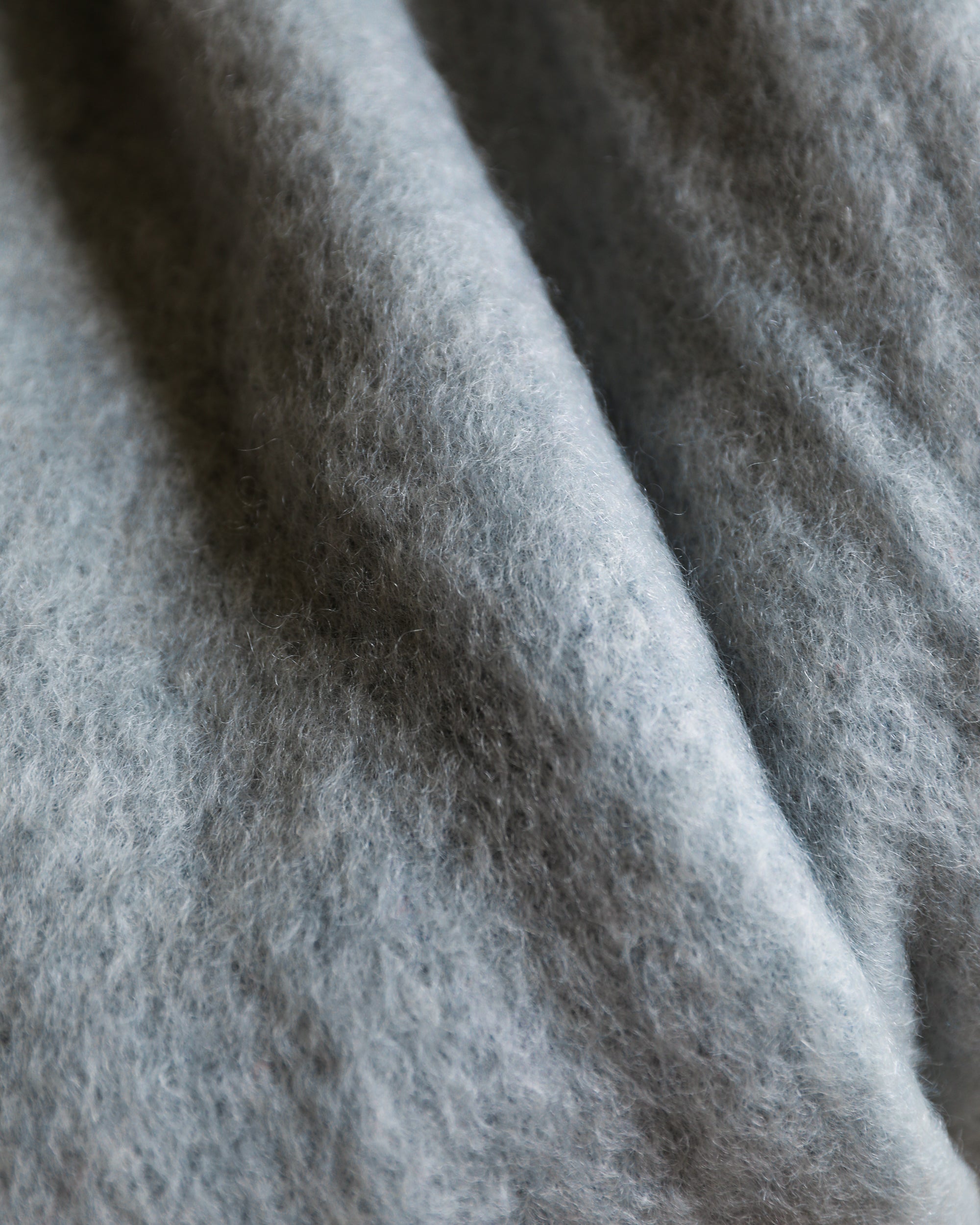 Mantas Ezcaray pale dusky blue mohair throw blanket closeup fabric detail