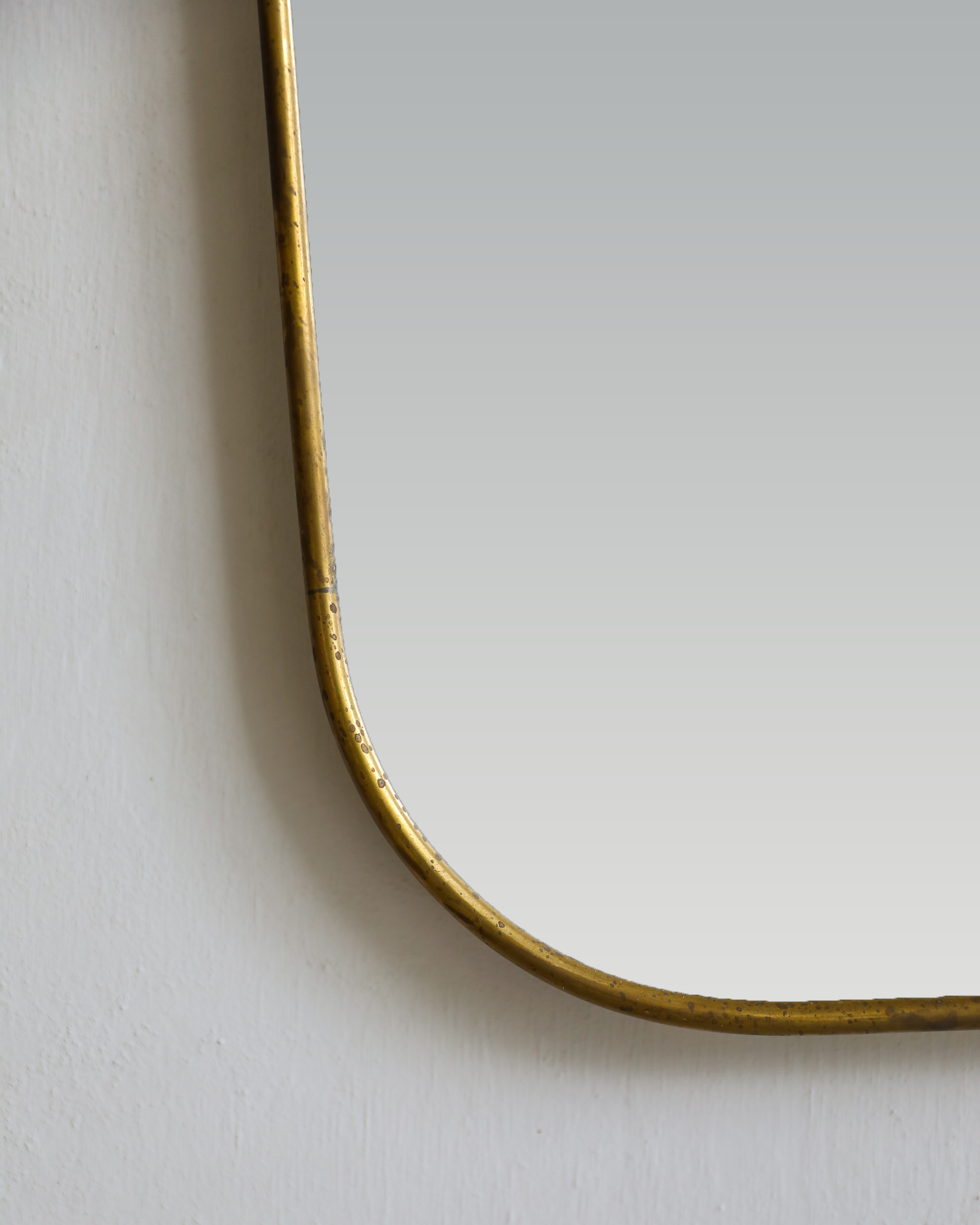 closup detail of patina in vintage italian brass gio ponti mirror