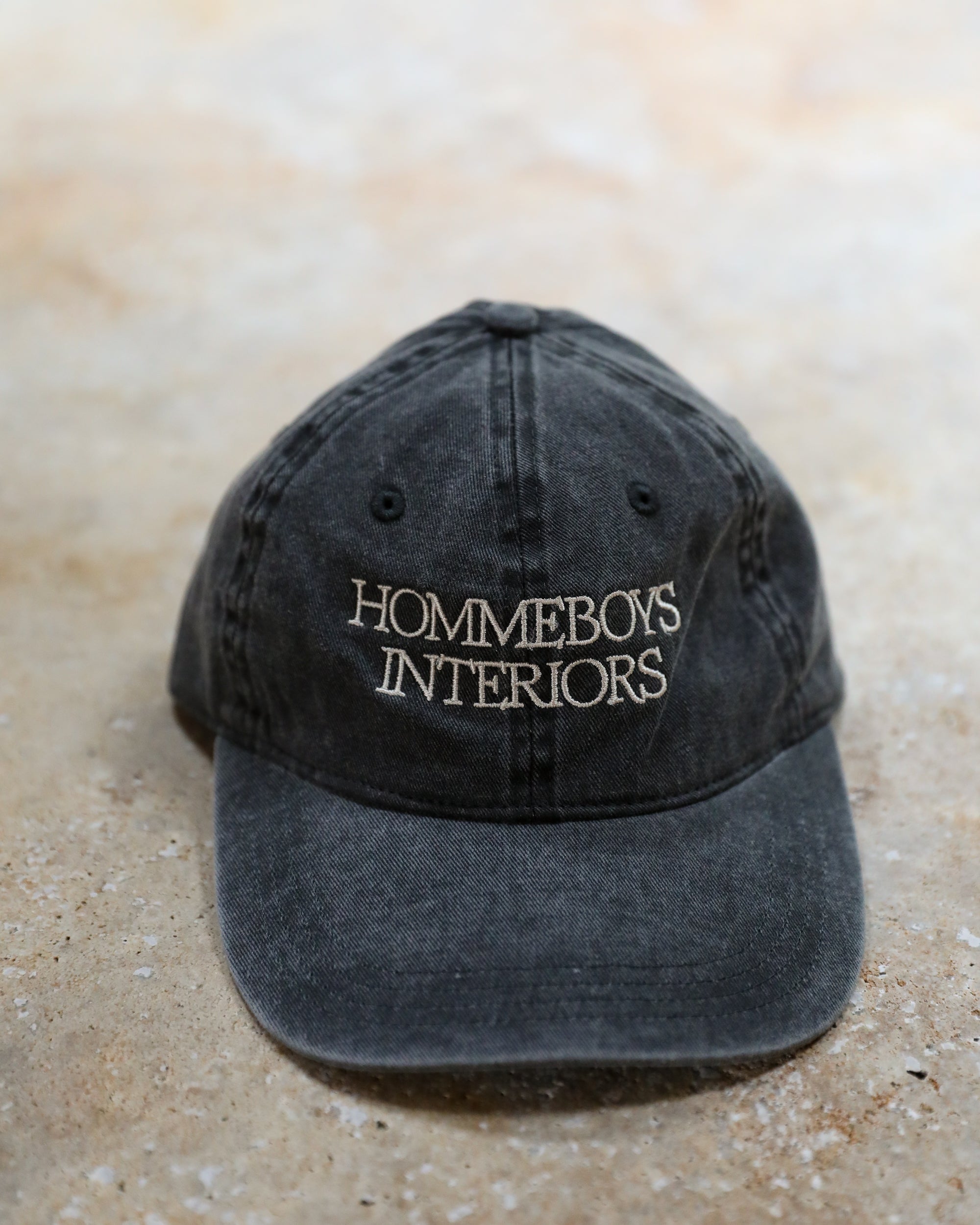 closeup detail of hommeboys black baseball cap