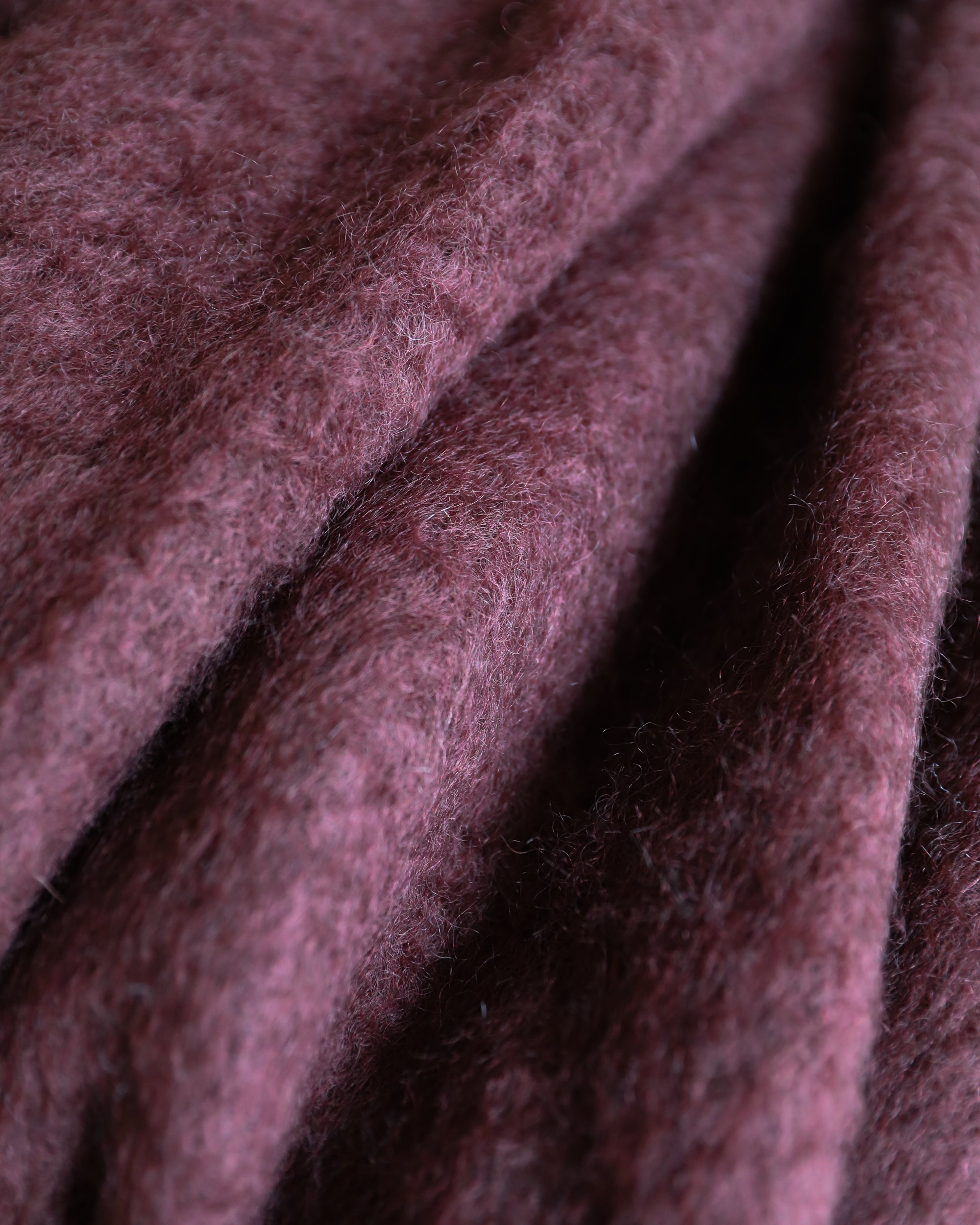 Mantas Ezcaray oxblood mohair throw blanket closeup fabric detail
