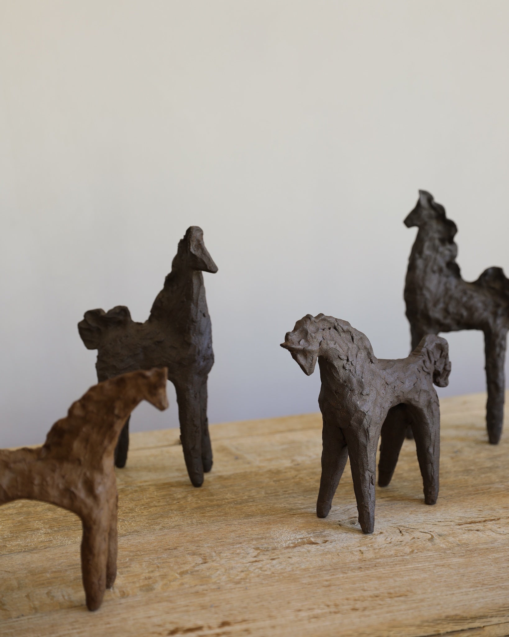 unglazed Fielding Clayworks handmade ceramic textured horse sculpture one-of-a-kind group