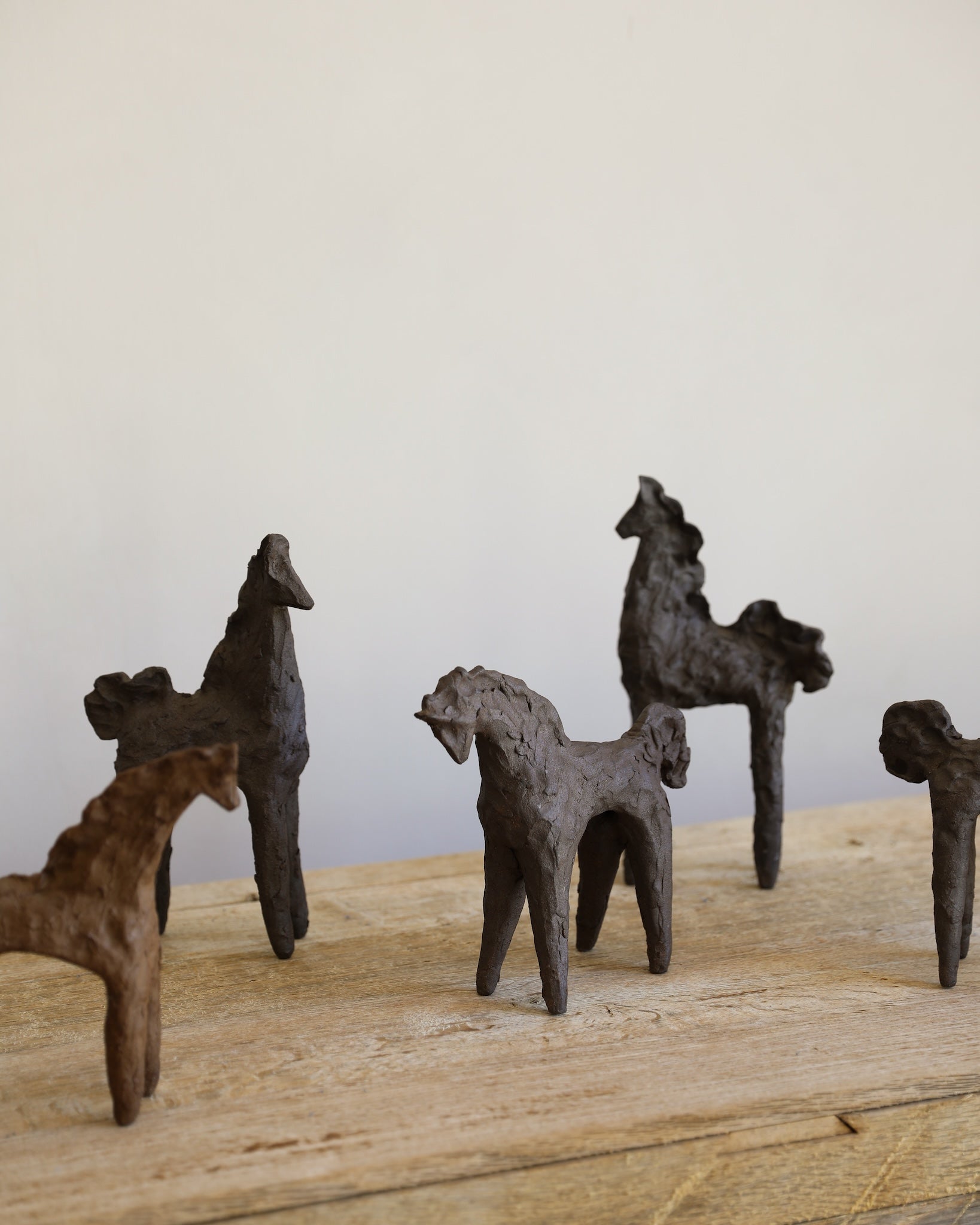 unglazed Fielding Clayworks handmade ceramic textured horse sculpture one-of-a-kind group