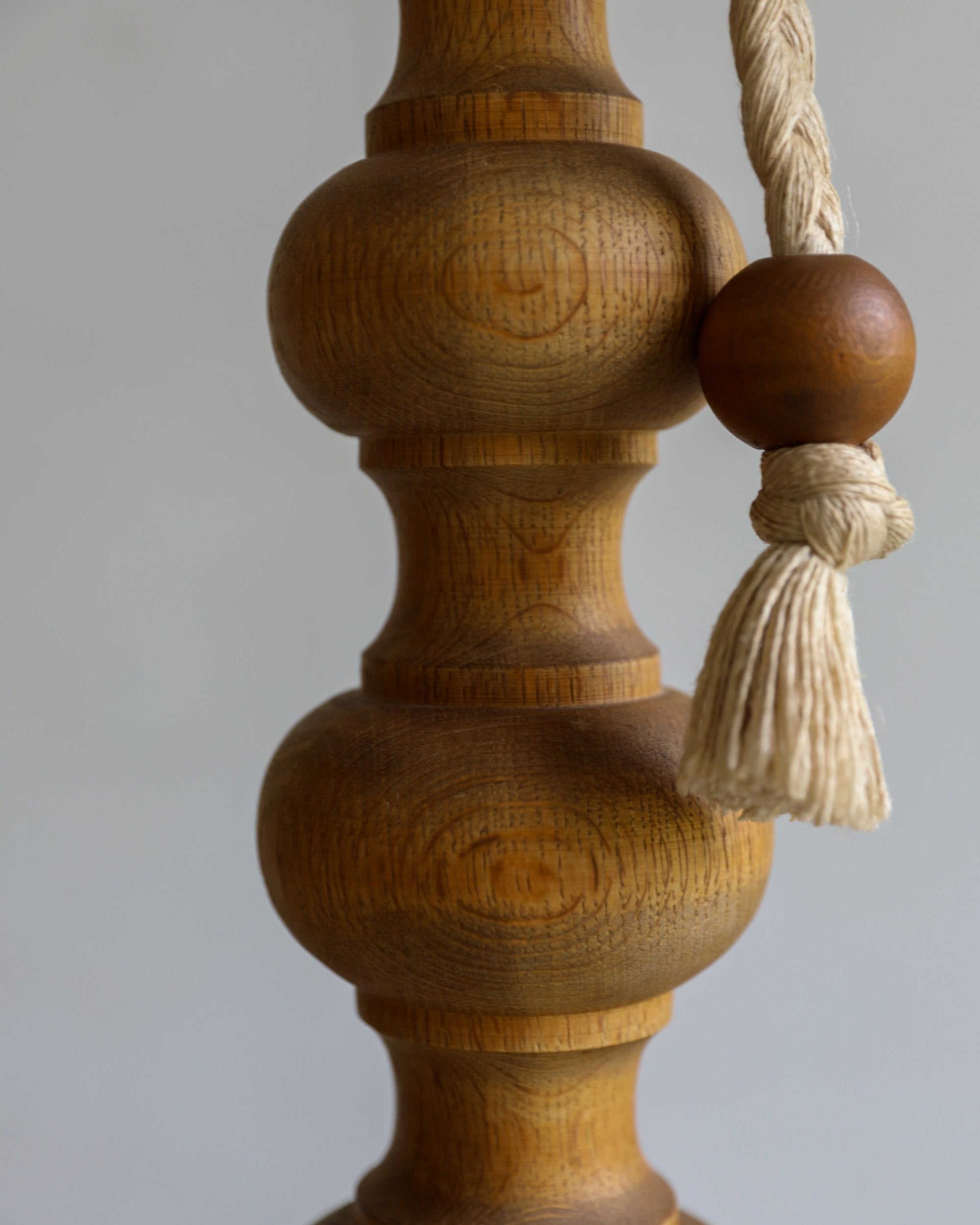 vintage turned wood floor lamp with rope pull detail and linen coolio shade pull detail