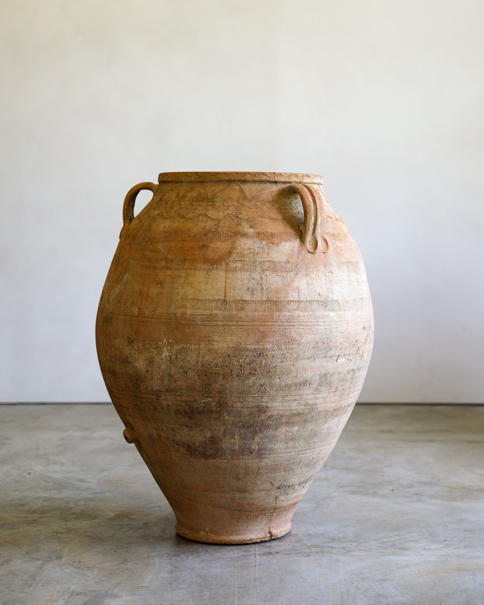 antique turkish handled olive jar with etching details and natural patina