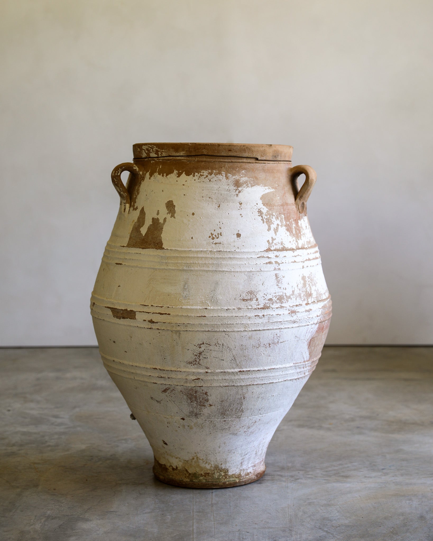 antique white turkish handled olive jar with etching details and natural patina