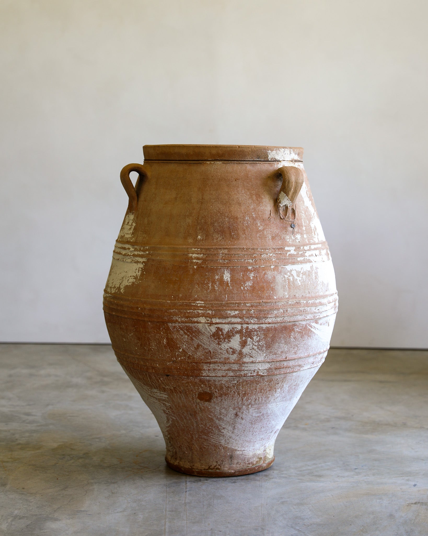 antique white turkish handled olive jar with etching details and natural patina