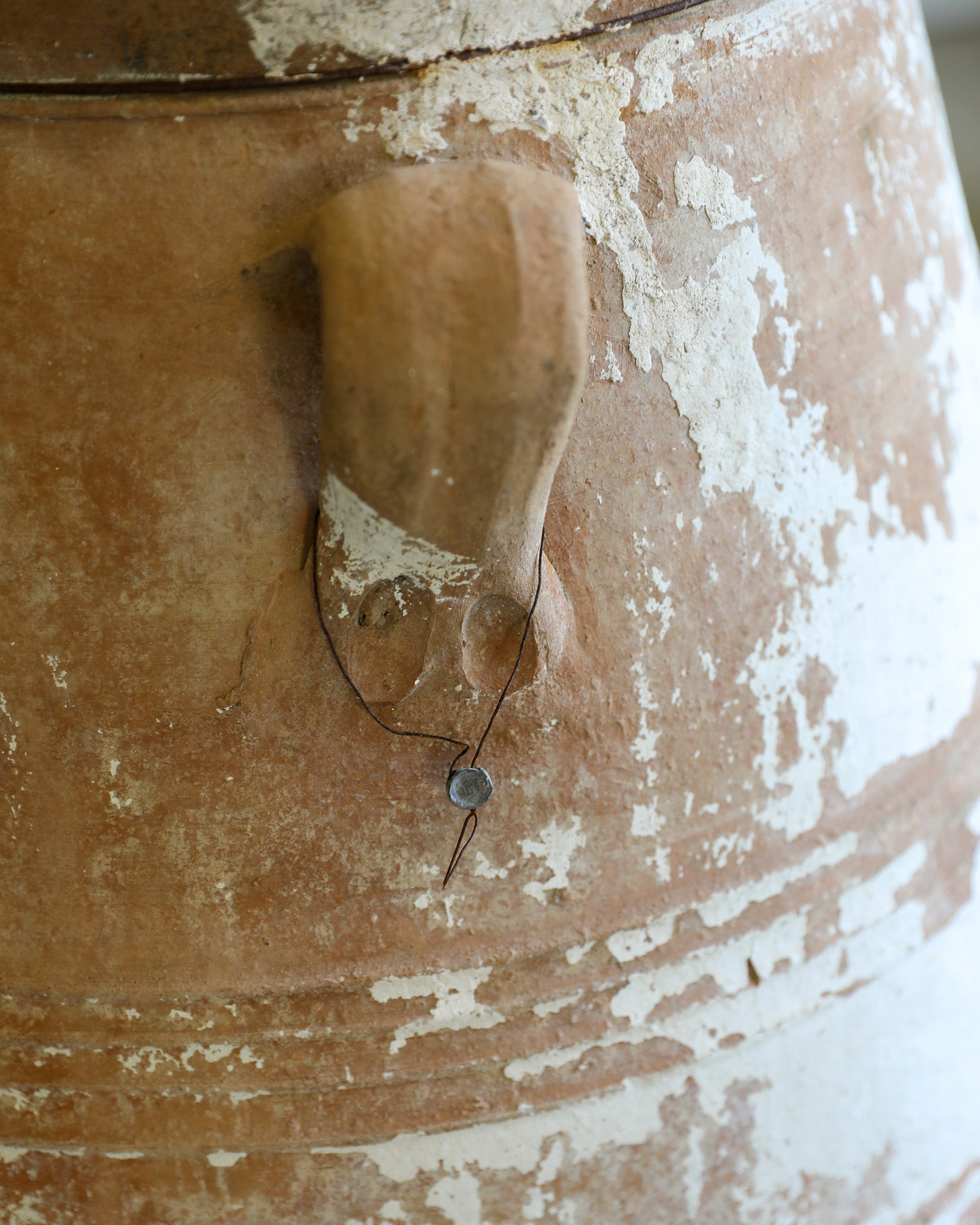 antique white turkish handled olive jar with etching details and natural patina closeup detail and authenticity tag