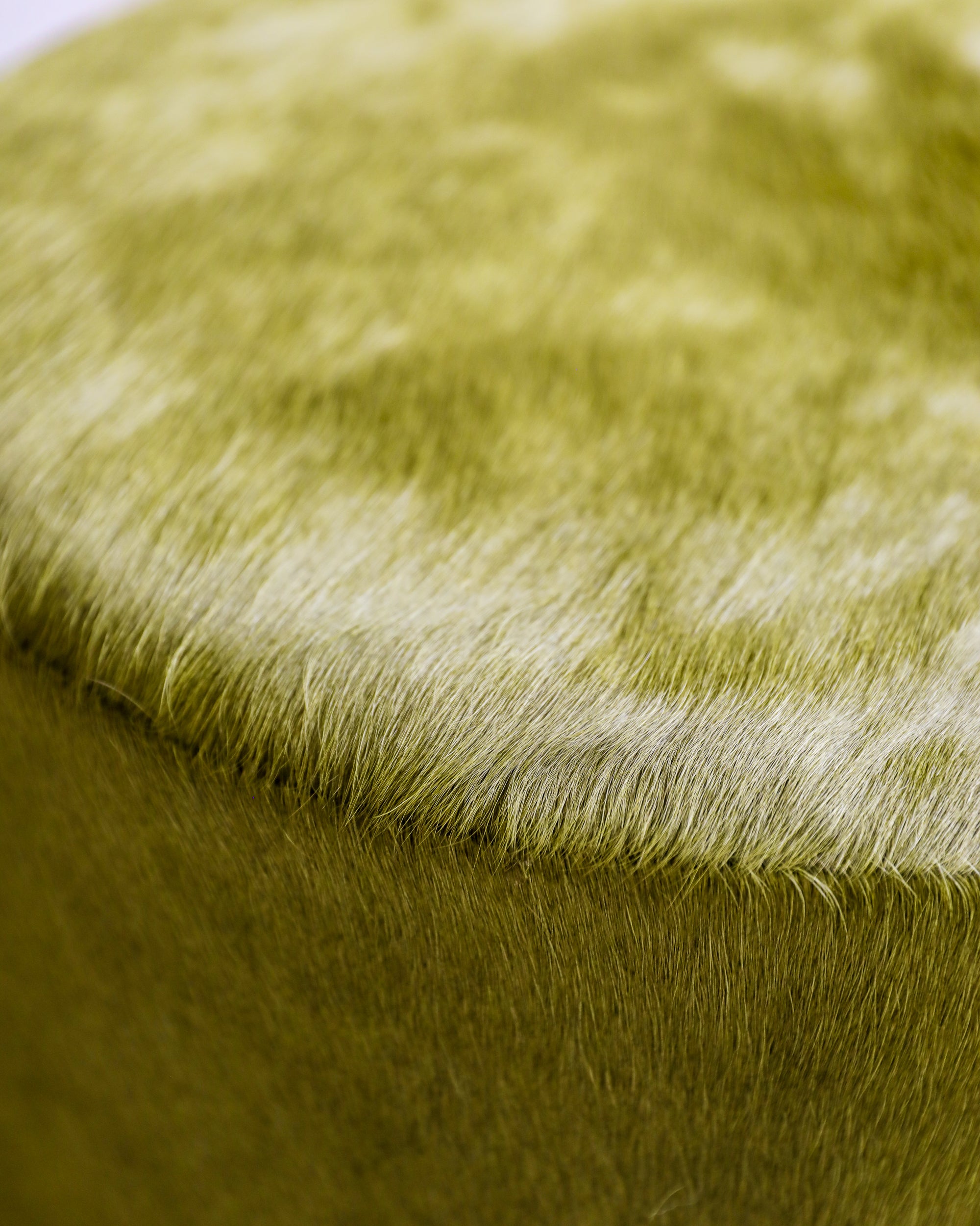 haus of hommeboys bishop pouf green pony hair closeup