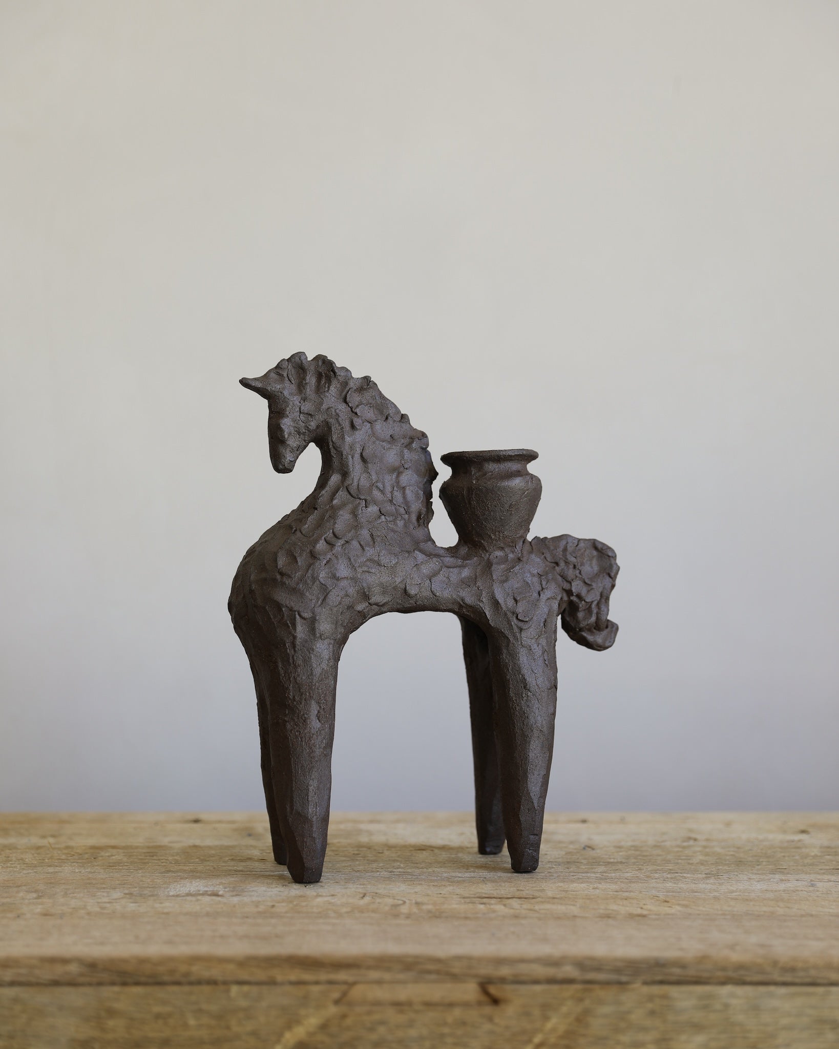 unglazed Fielding Clayworks handmade ceramic horse with pot candle holder