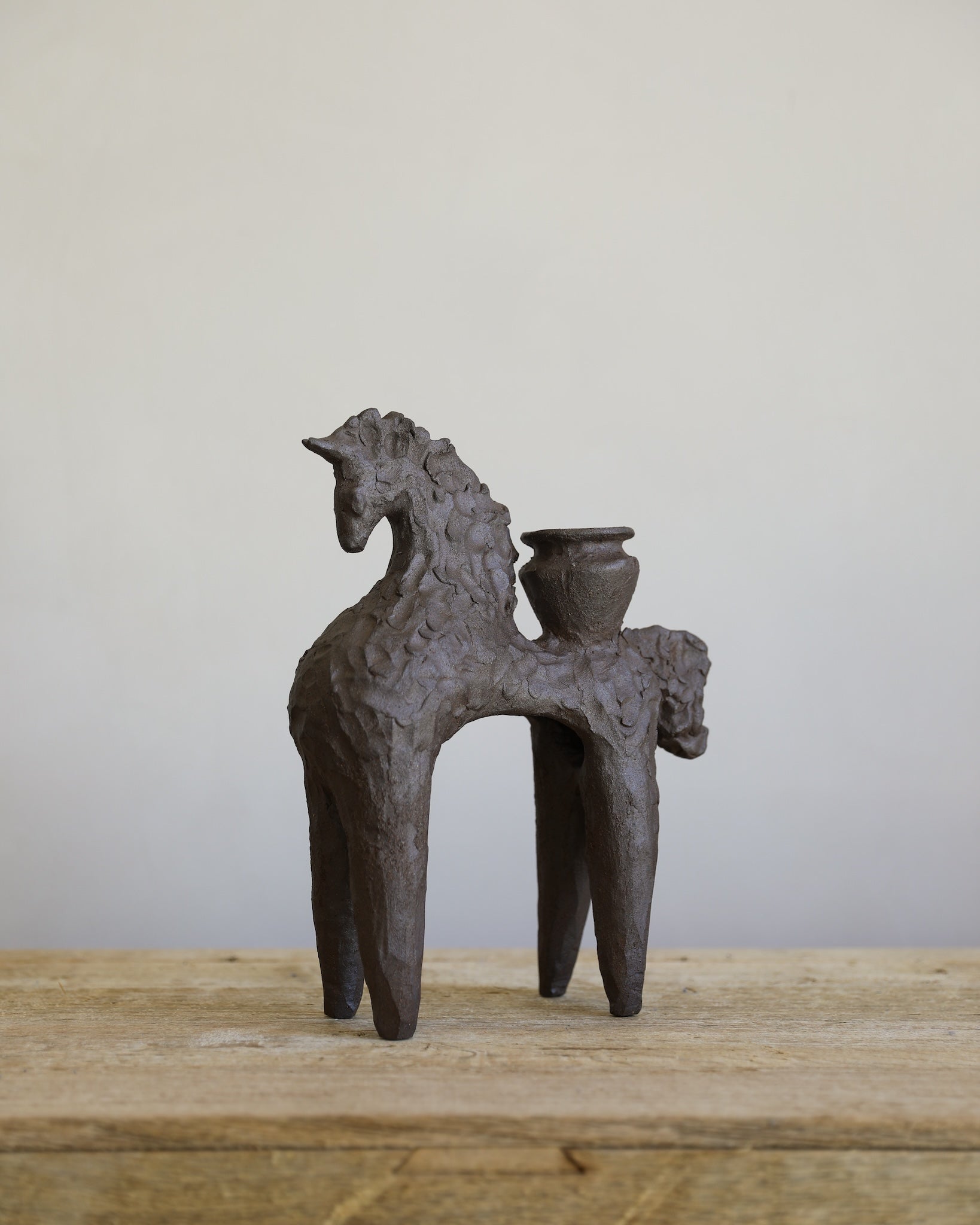 unglazed Fielding Clayworks handmade ceramic horse with pot candle holder