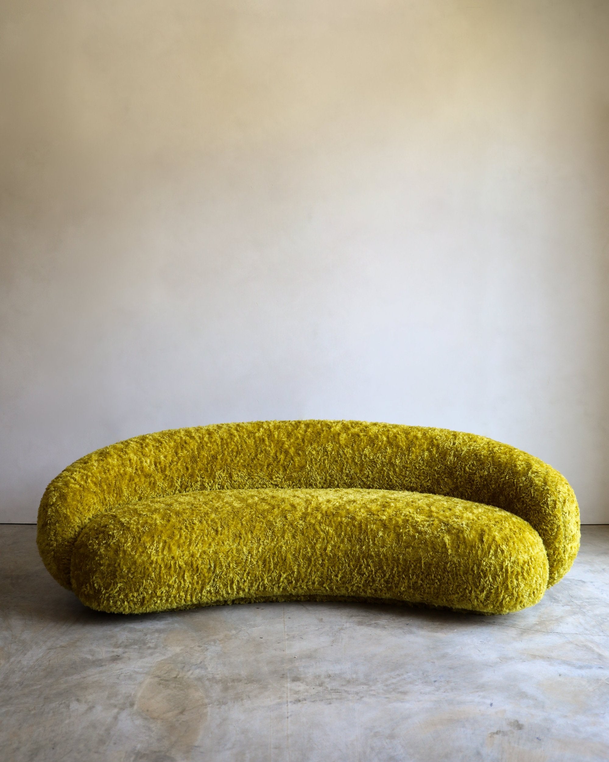 vintage Julep Sofa from Taccini recovered in a brilliant, rich yellow Argo wool mohair from Raf Simmons