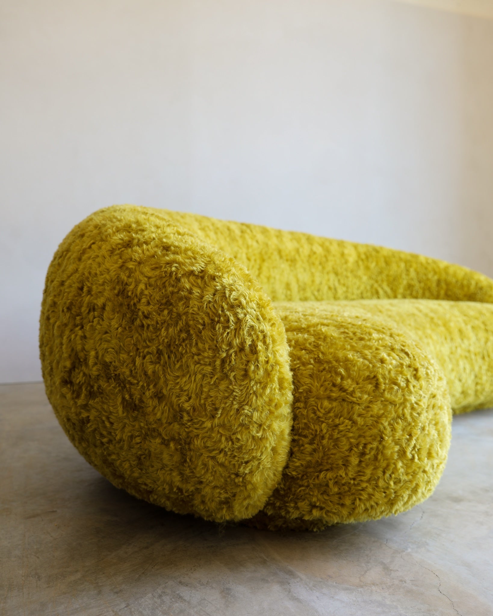 vintage Julep Sofa from Taccini recovered in a brilliant, rich yellow Argo wool mohair from Raf Simmons side view