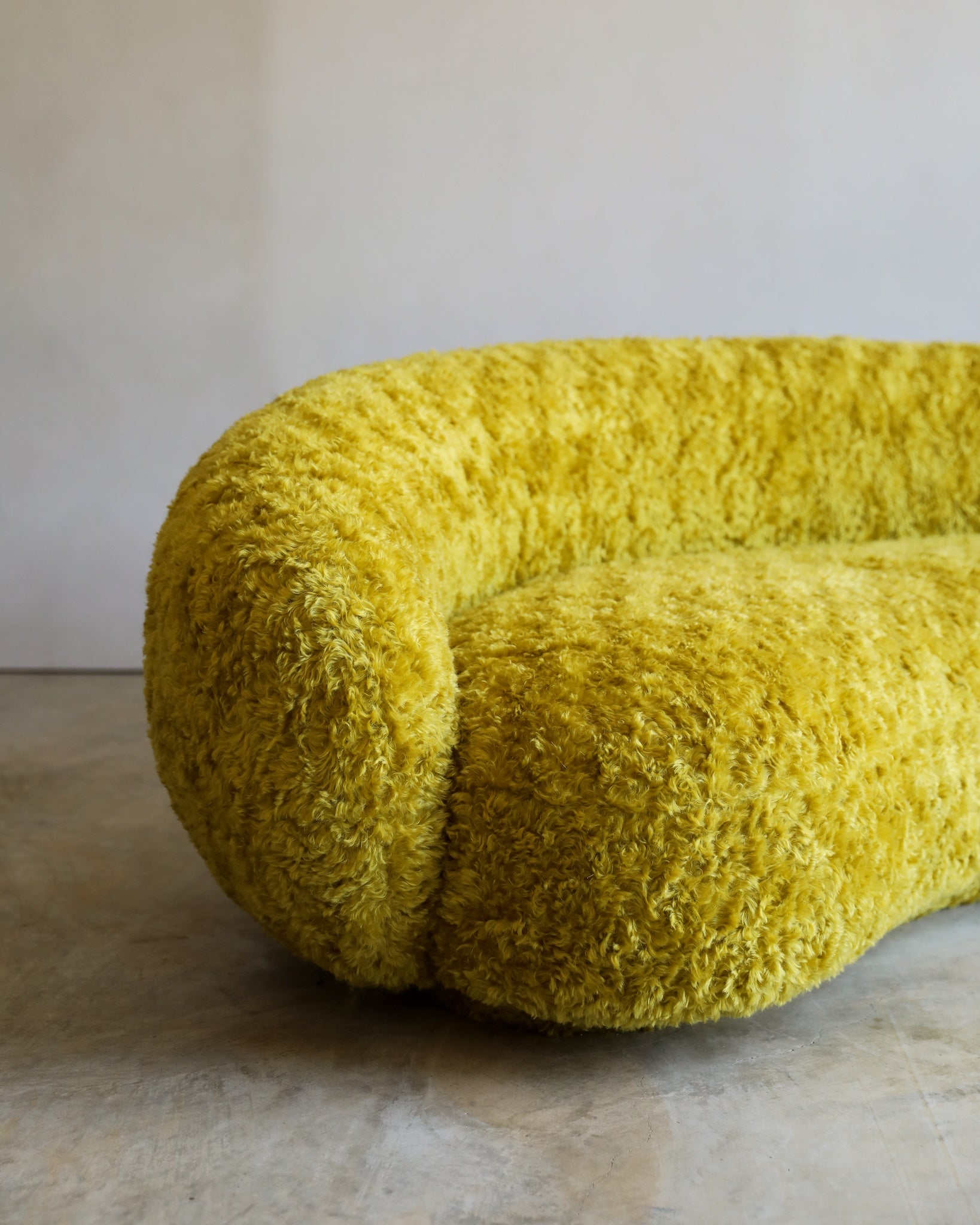 vintage Julep Sofa from Taccini recovered in a brilliant, rich yellow Argo wool mohair from Raf Simmons corner detail