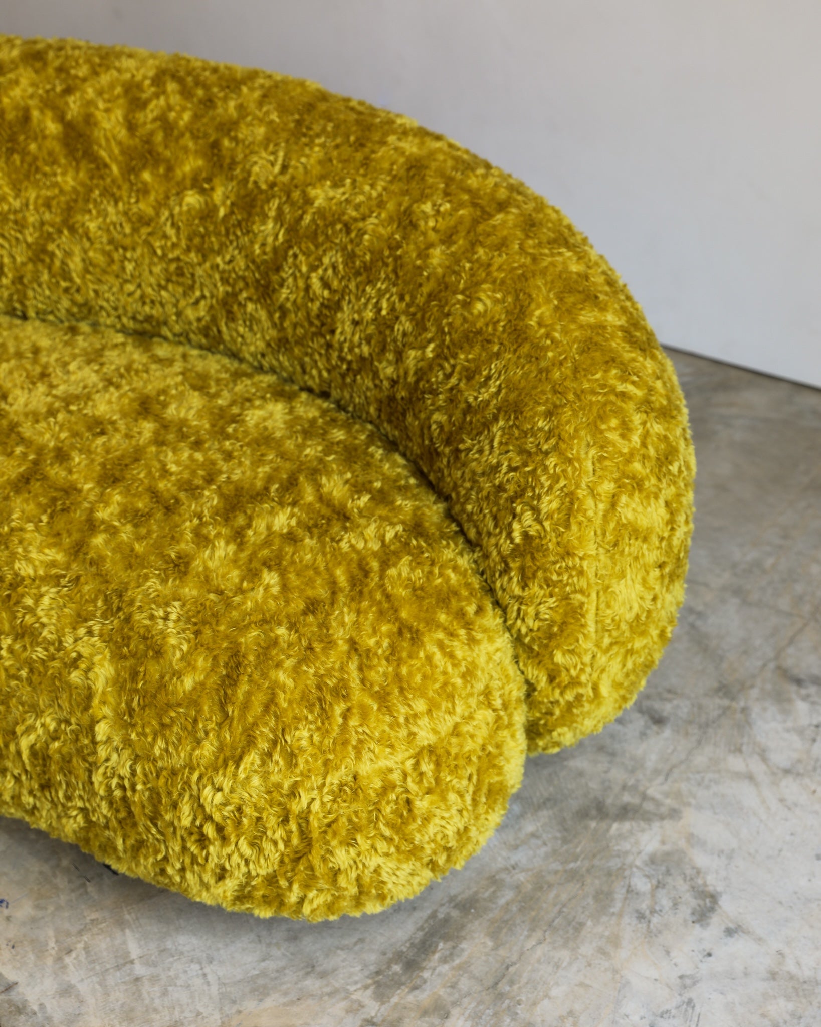 vintage Julep Sofa from Taccini recovered in a brilliant, rich yellow Argo wool mohair from Raf Simmons