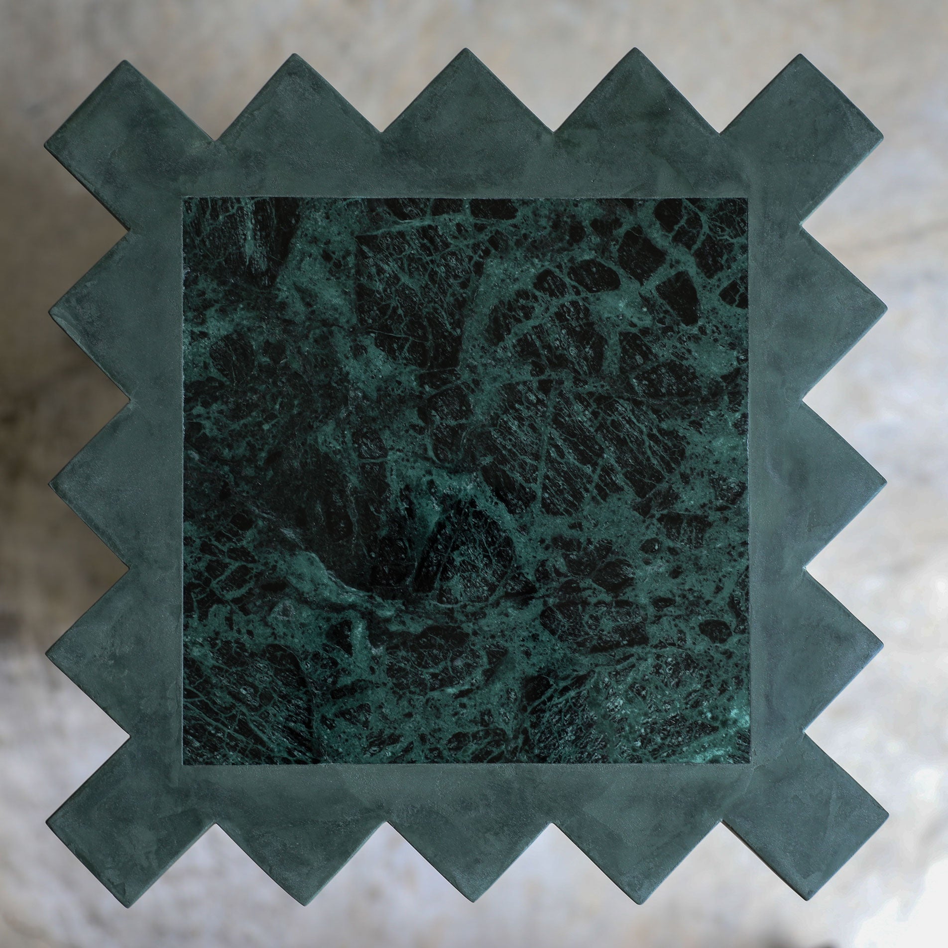 haus of hommeboys lone pedestal in green faceted vert plaster with marble inset