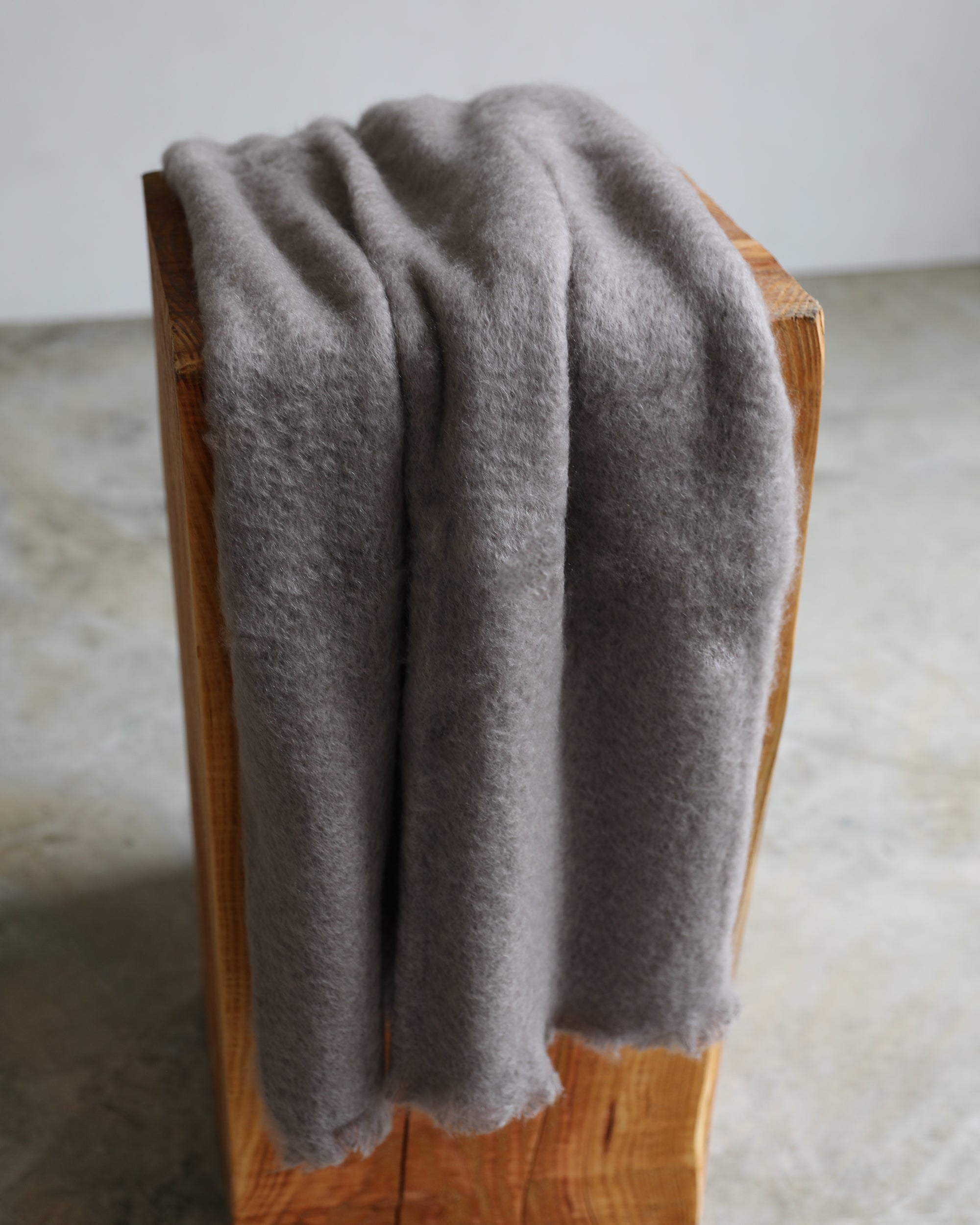 Mantas Ezcaray mushroom mohair throw blanket taupe color