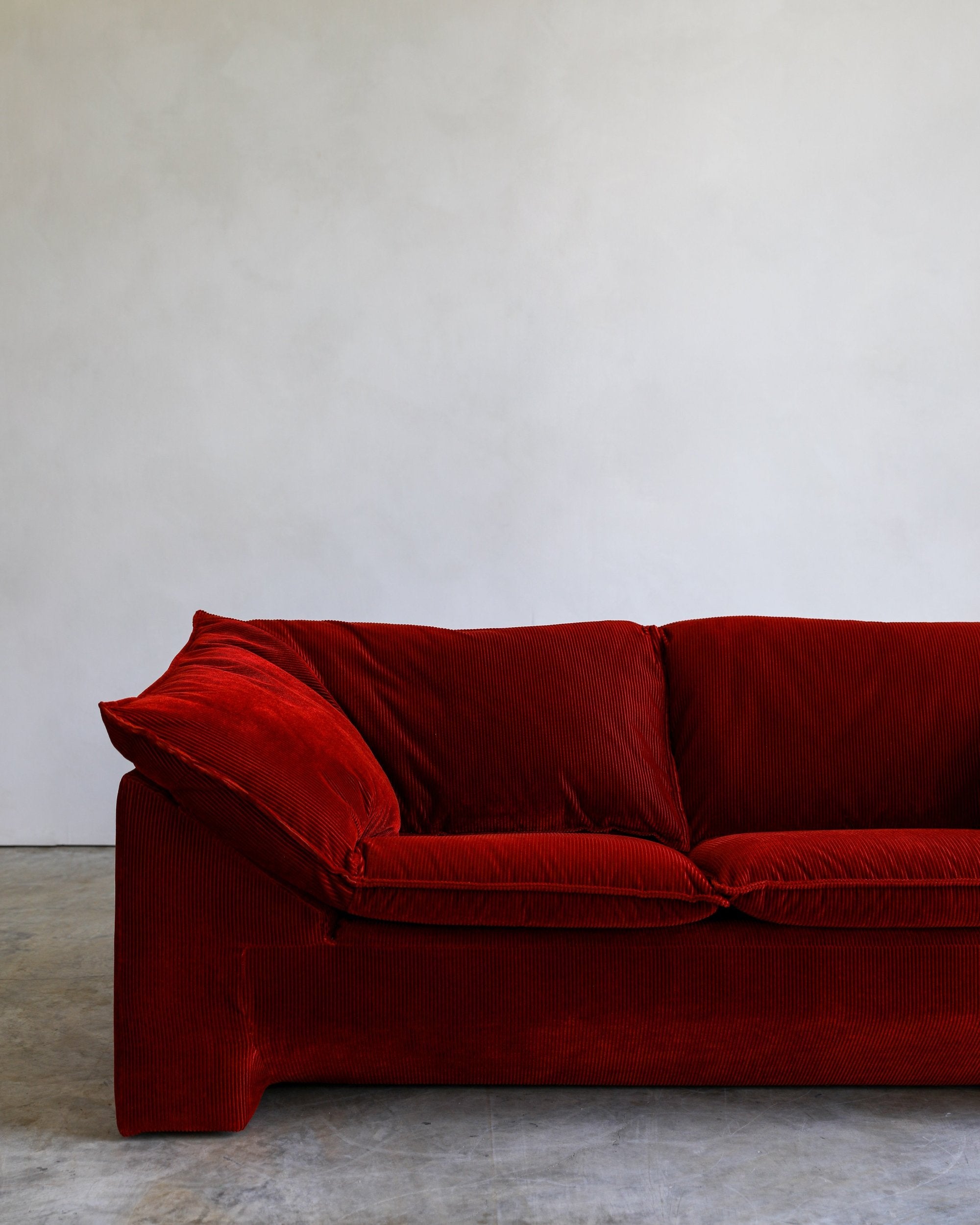 vintage danish Niels Eilersen Monza Sofa reupholstered in red corduroy fabric closeup