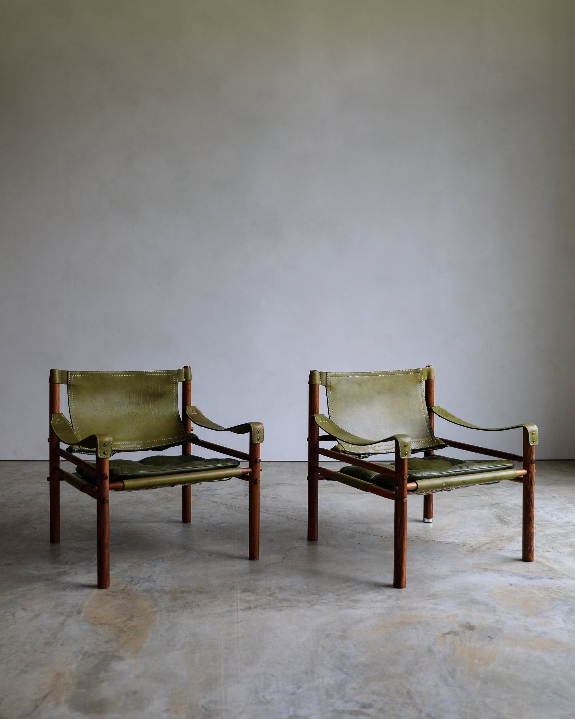 vintage swedish Arne Norell Sirocco Chair Pair in rosewood and original green leather upholstery