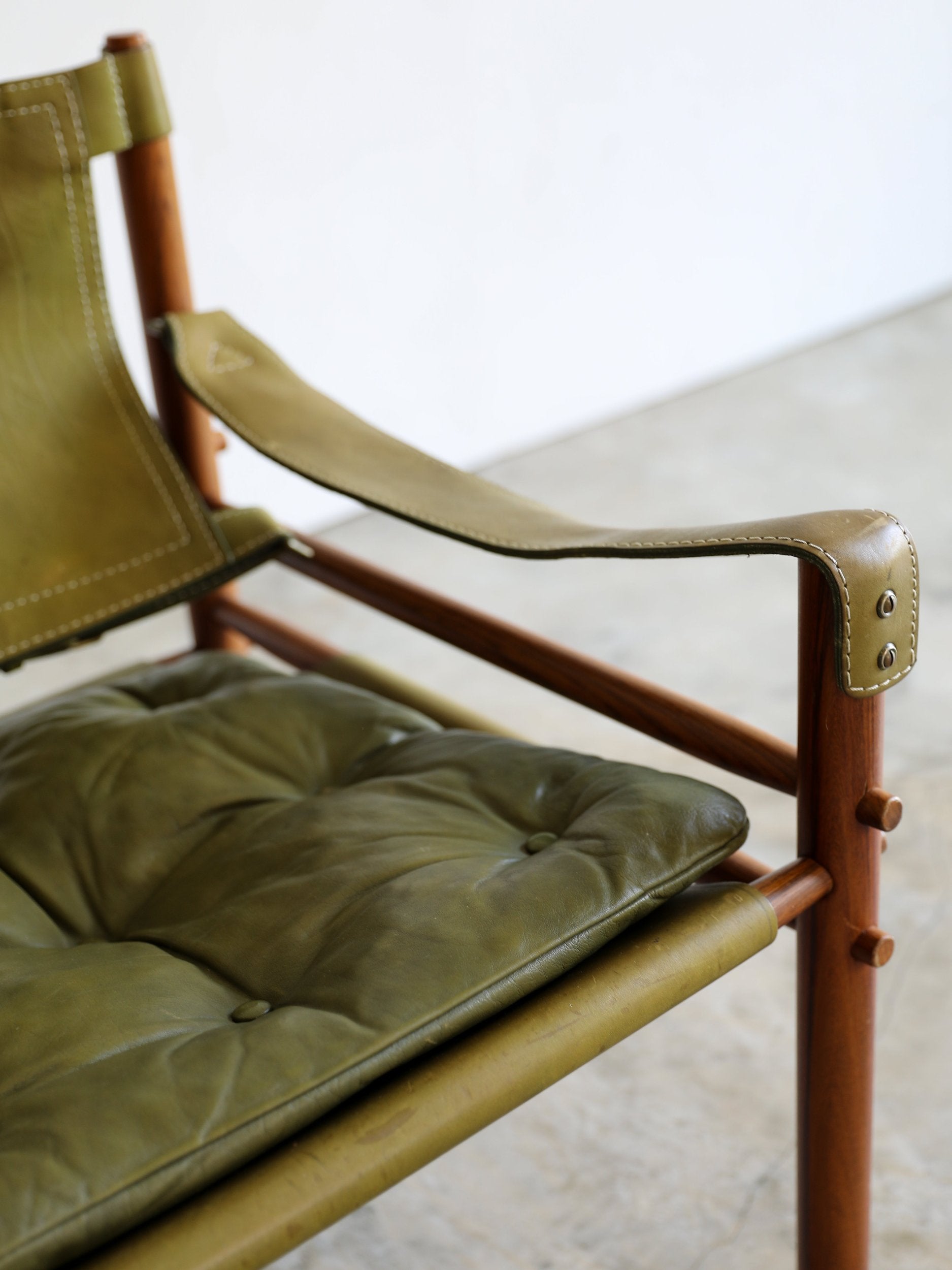 vintage swedish Arne Norell Sirocco Chair Pair in rosewood and original green leather upholstery seat and arm detail