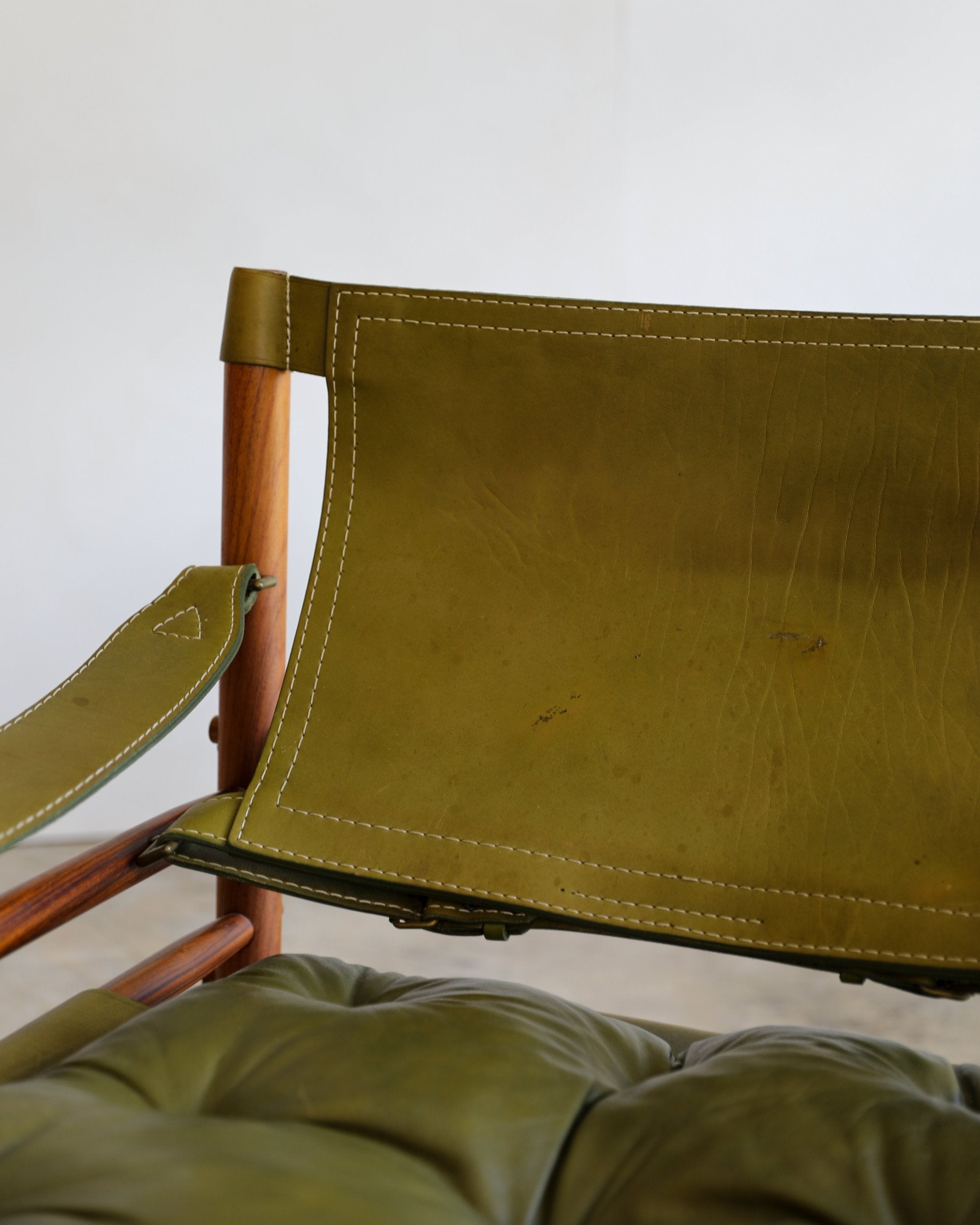 vintage swedish Arne Norell Sirocco Chair Pair in rosewood and original green leather upholstery back wear