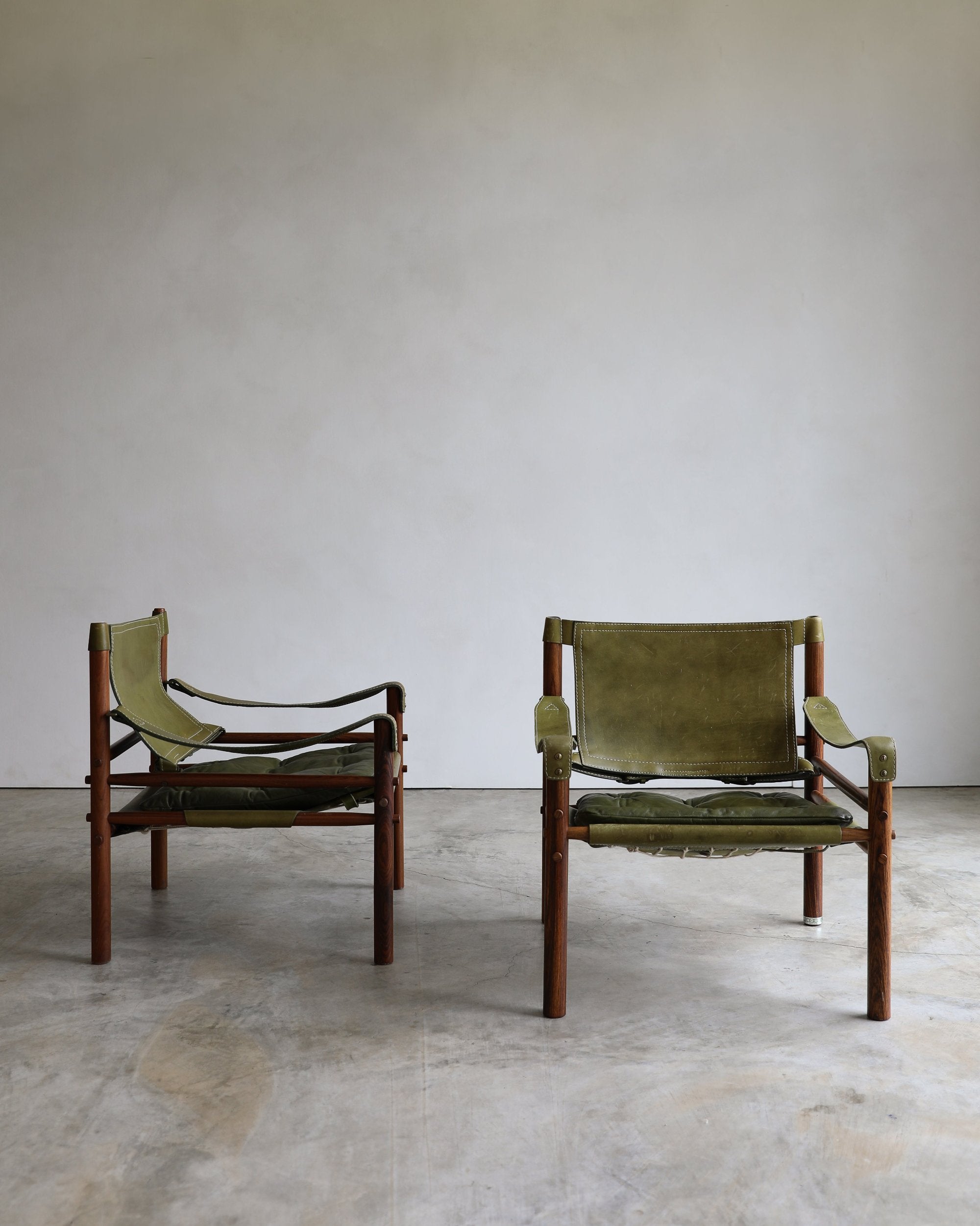 vintage swedish Arne Norell Sirocco Chair Pair in rosewood and original green leather upholstery