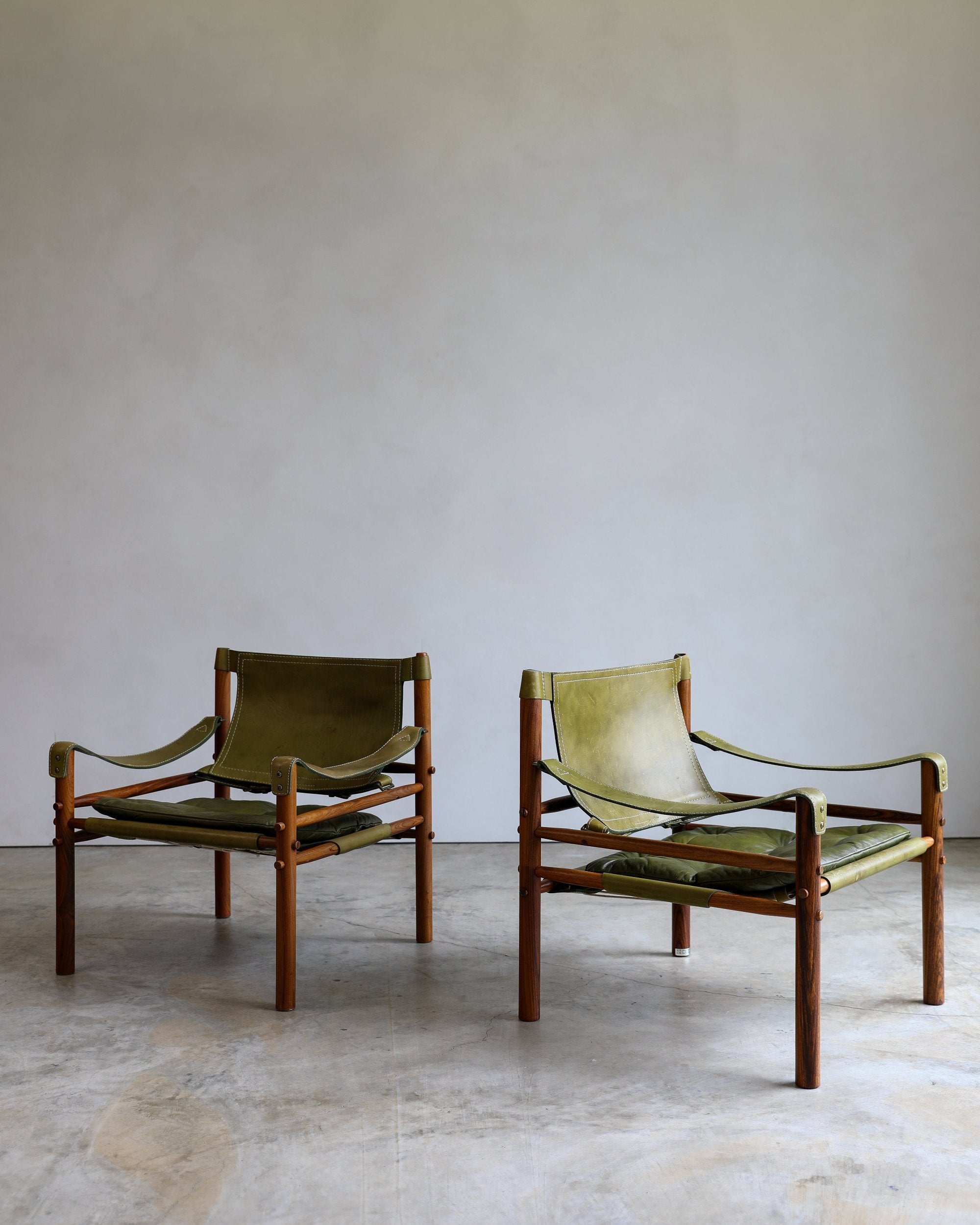 vintage swedish Arne Norell Sirocco Chair Pair in rosewood and original green leather upholstery