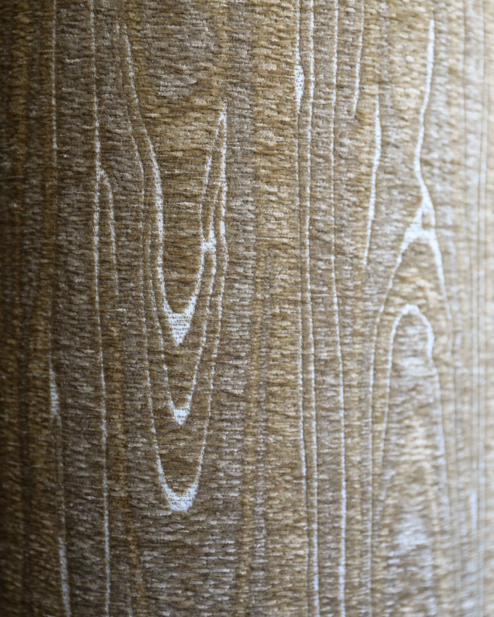 close up of faux bois wood patterned velvet fabric