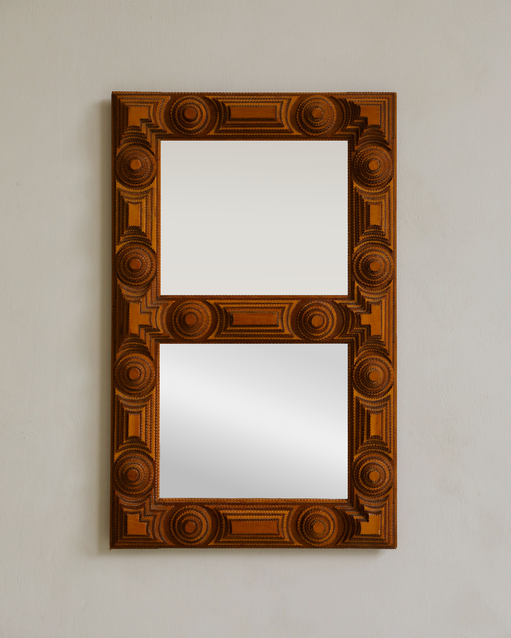 vintage tramp art mirror with carved detailing