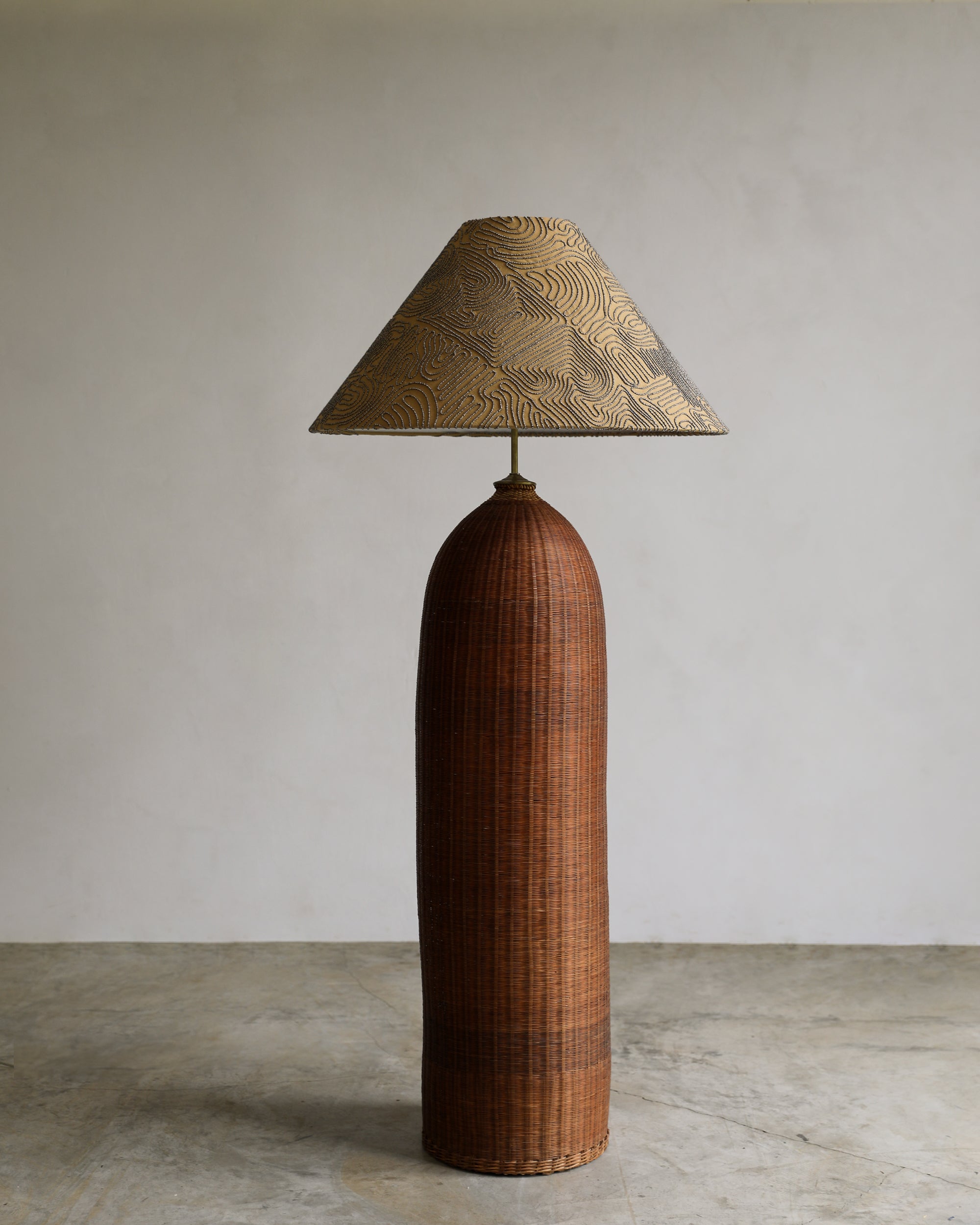 vintage wicker floor lamp with custom lamp shade covered in elitis llenya embroidered linen fabric